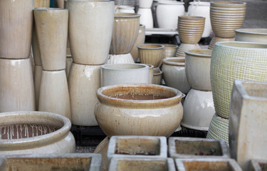 Many different plant pots up for sale
