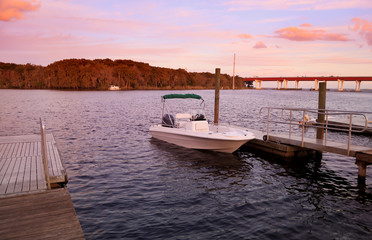 Fototapeta premium Single motor boat at Monroe Lake in Florida 