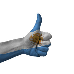Hand making thumbs up sign, argentina painted with flag as symbol of thumbs up, like, okay, positive  - isolated on white background