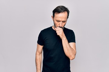Middle age man wearing casual black t-shirt standing over isolated white background feeling unwell...