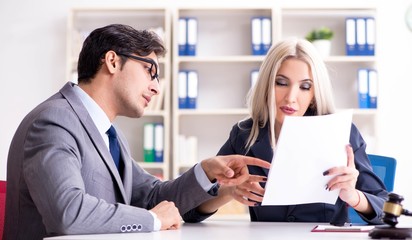 Lawyer discussing legal case with client