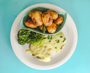 fish with roasted potatoes and mustard meal