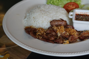 Close up Fried pork with rice.