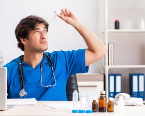 Young doctor working in the hospital