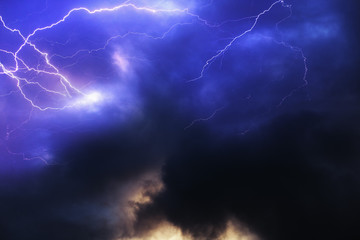 Lightning in a dark blue stormy sky