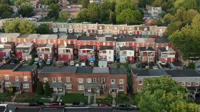 Aerial truck shot of slums in United States, low income, poverty housing, slumlord, crime district, urban America city establishing shot