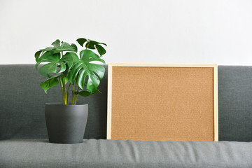Artificial plant, Philodendron monstera pot and cork board for wording mockup, Indoor tropical...