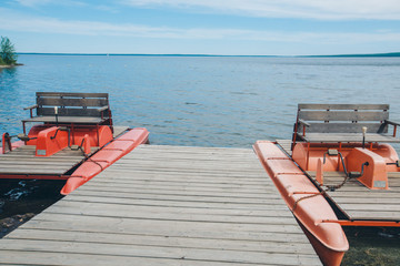 fishing bridge by the river. boat landing on the lake. water and transport