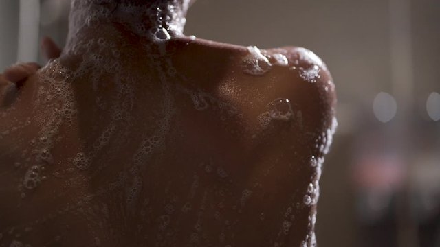 Slow motion clips,Beautiful woman taking a shower with a shower.