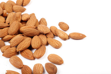 Group of almonds isolated on white.