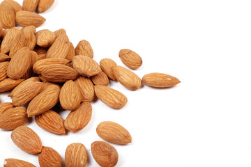 Group of almonds isolated on white.