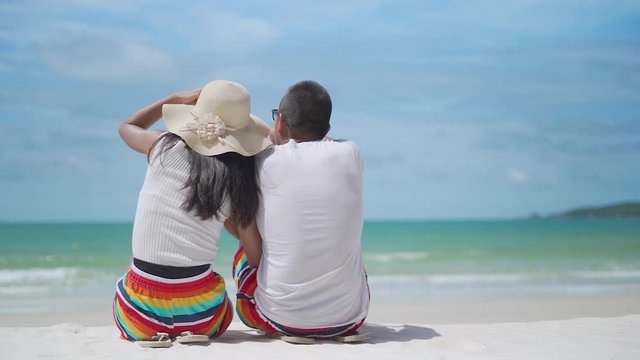 Slow motion clips,The couple happily sat on the beach together,Koh Samed Thailand.
