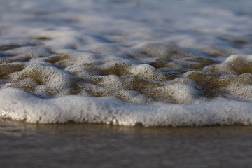 Waves breaking on a remote surf beach, New Zealand. 