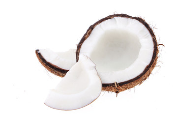 Fresh raw coconut with palm leaves isolated on white background. High resolution image