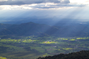 view from the top of mountain with light of sunset