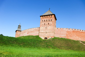 Fototapeta na wymiar View to Palace tower of the Velikiy (Great) Novgorod citadel (kremlin, detinets) in Russia under blue summer sky in the morning 