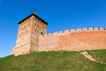 Fototapeta na wymiar View to Palace tower of the Velikiy (Great) Novgorod citadel (kremlin, detinets) in Russia under blue summer sky in the morning 