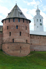 View to Metropolitan tower and wall of the Velikiy (Great) Novgorod citadel (kremlin, detinets) in Russia under blue summer sky in the morning