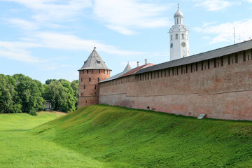 View to Metropolitan tower and wall of the Velikiy (Great) Novgorod citadel (kremlin, detinets) in Russia under blue summer sky in the morning