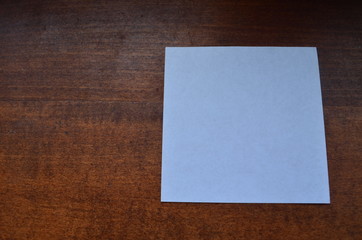 blank paper on wooden background