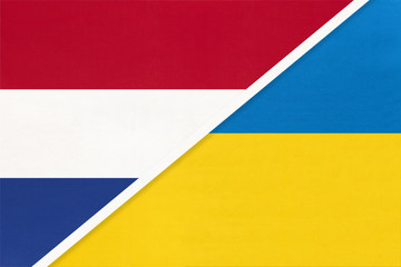 Netherlands or Holland and Ukraine, symbol of national flags from textile. Championship between two countries.