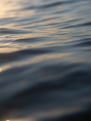 Small waves breaking on a surf beach, New Zealand. 