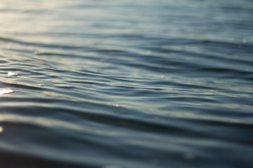 Small waves breaking on a surf beach, New Zealand. 