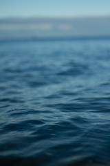 Small waves breaking on a surf beach, New Zealand. 