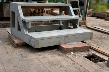 wooden staircase freshly painted in gray