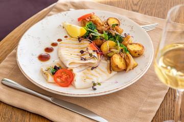 grilled squid with a side dish in the interior