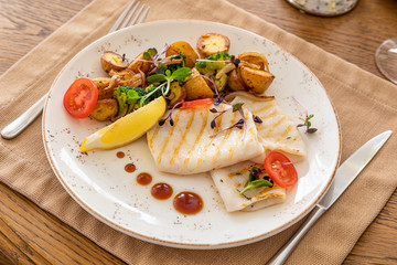 grilled squid with a side dish in the interior