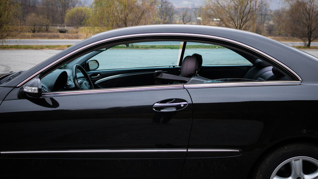 Cluj Napoca/Romania - June 20, 2018: Mercedes Benz W209 Coupe - year 2011, Avantgarde equipment, black anthracite leather interior, CLK class, open door, Sport edition, Aluminium trims, inside view