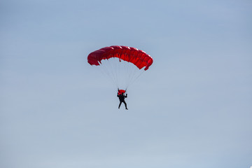 City Riga, Latvian republic. Parachutists land with parachutes on target.