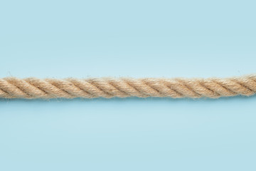 Long rope on color background