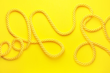 Long rope on color background
