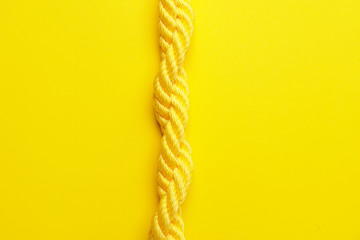 Long rope on color background