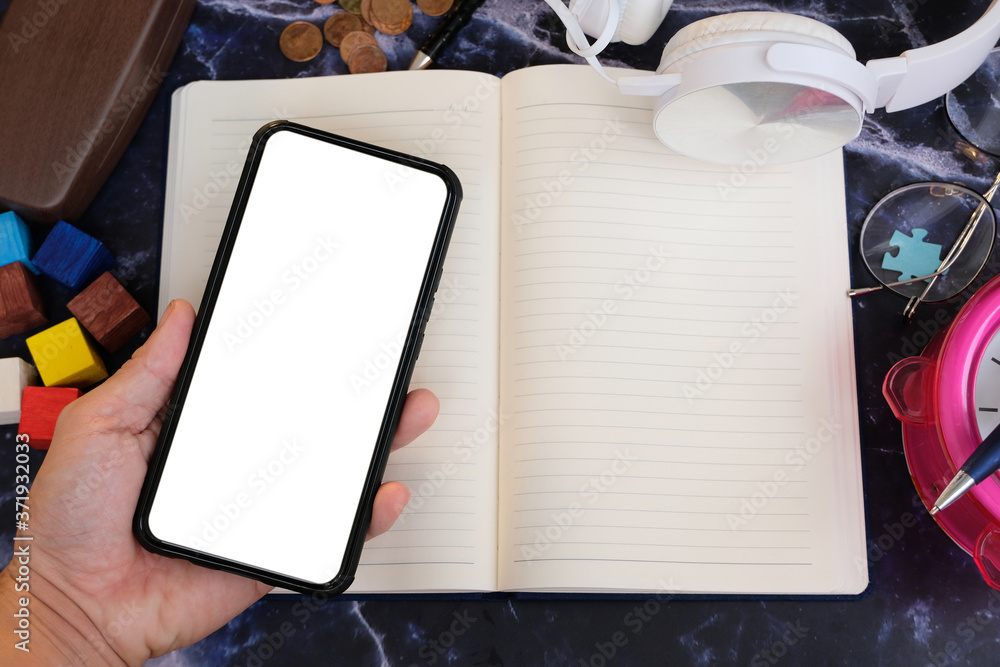 Poster businessman using a smartphone and working on the table
