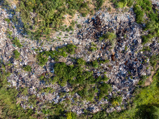 Illegal storage of solid household waste, plastic bottles and garbage bags. Land pollution Aerial...