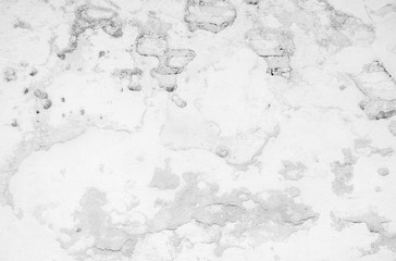 Obraz premium The black and white concept of an old brick wall with plastered and cracked surface that is used for the background, Old stucco light gray and paint white brick wall, Old white walls.