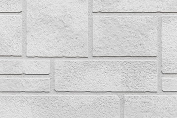 Block pattern of white stone cladding wall tile texture and seamless background