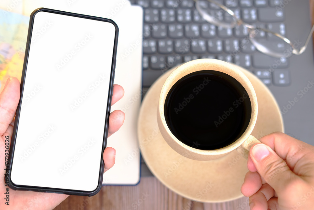 Poster businessman using a smartphone and working on the table
