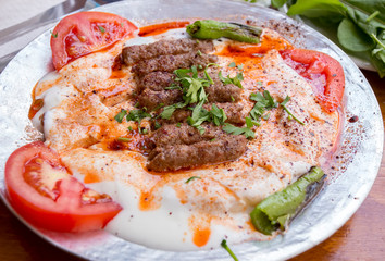 Traditional Delicious Turkish foods collection; Manisa Kebab, grilled meatball with yoghurt