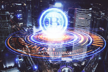 Multi exposure of cryptocurrency theme hologram drawing and city veiw background. Concept of...