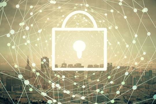 Lock icon hologram on city view with skyscrapers background multi exposure. Data security concept.