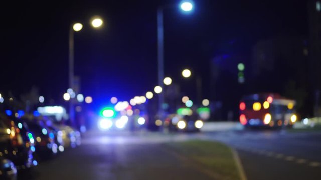 Car accident at night, blue police lights blinking on street, soft focus background, great web cover