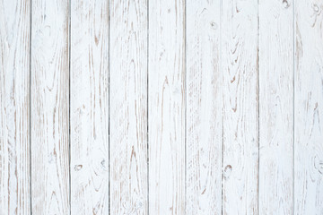 surface of white wood boards worn in vertical position. for vintage backgrounds, wedding invitations, spring motifs and backgrounds or Christmas cards