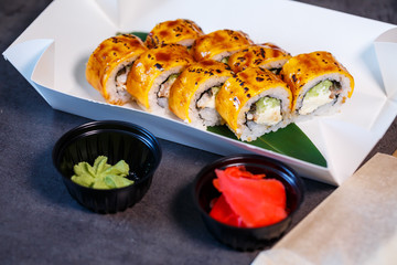 A set of sushi from many types of roles and with different stuffing. Sushi menu. Japanese gourmet sushi.