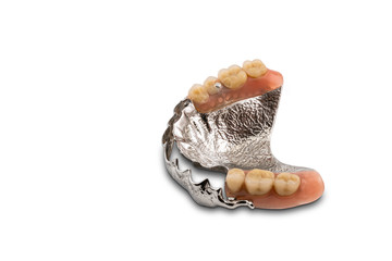 Removable swinglock denture isolated on white background.