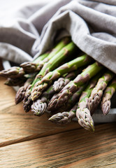 Asparagus  on old wooden  background.