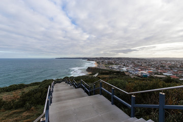 Coastal walk stairs going down towards Bar Beach, Newcastle, Australia.